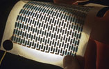 A foldable array of solar cells printed on a sheet of paper